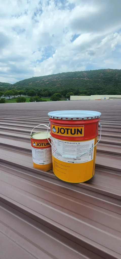 jotun cans on roof scaled e1780116787687